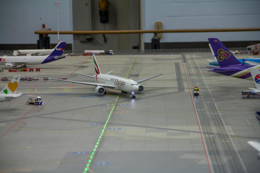 An Emirates Airlines 777 taxis at Miniatur Wunderland in Hamburg, Germany