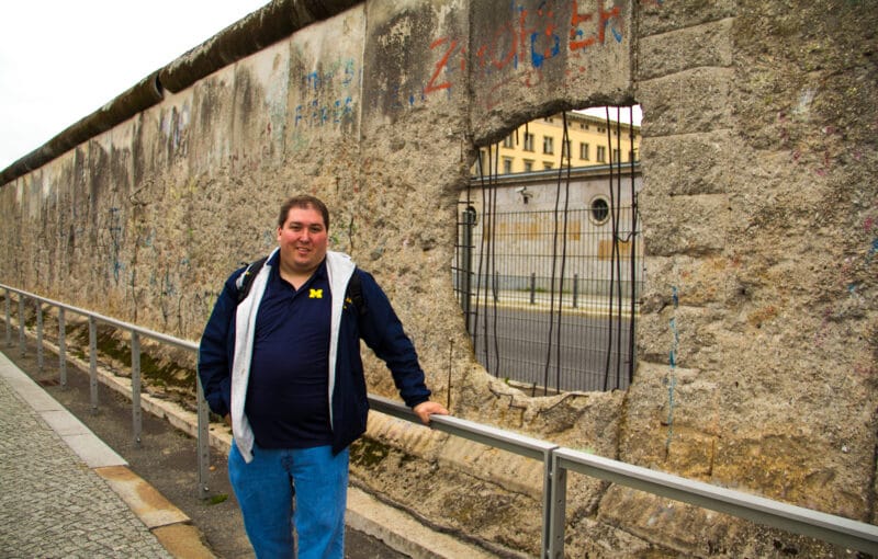 Me in front of the Berlin Wall