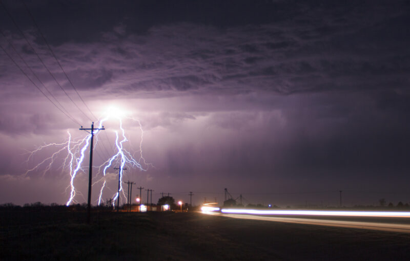 Lightning next to the highway