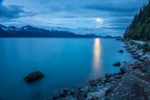 Moon shines over Resurrection Bay in Seward, AK