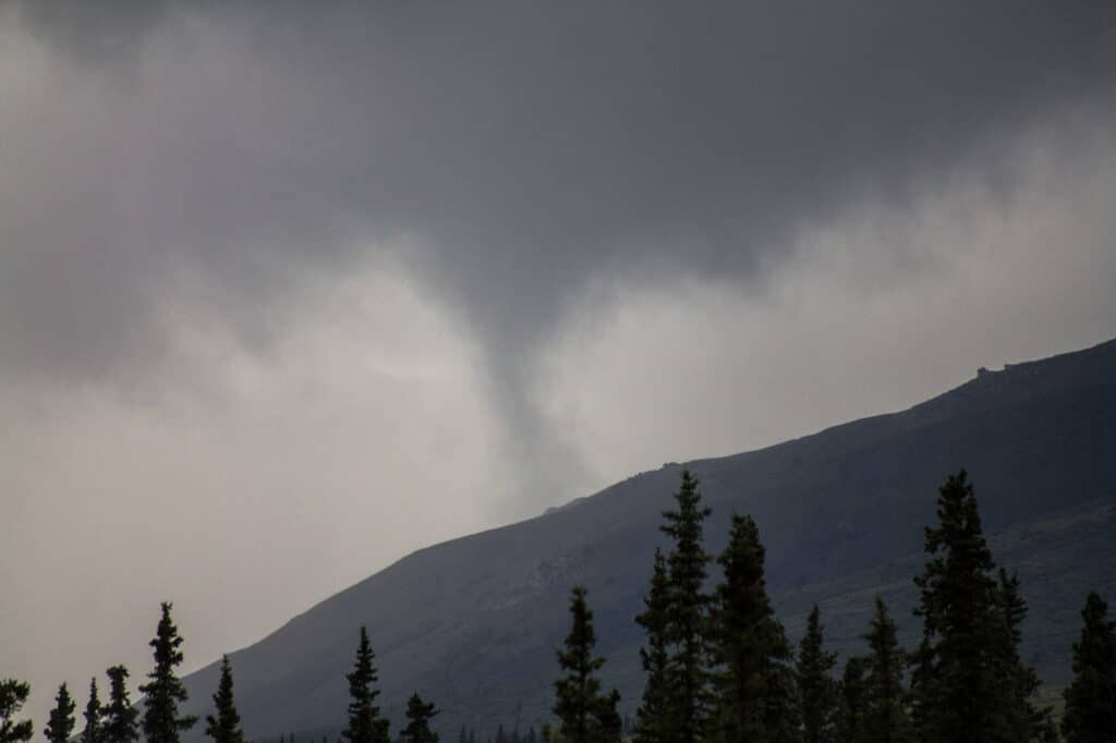 Cloud shaped like a tornado over a mountain in Denali National Park