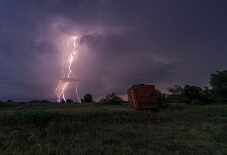 Lightning strikes behind a boxcar in Turkey, TX