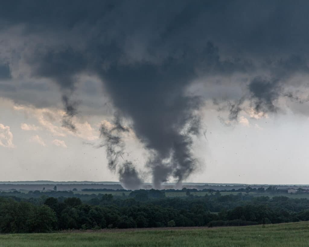Vorticies dance around the Wynnewood Tornado shortly after touchdown as it continues to gain organization and strength