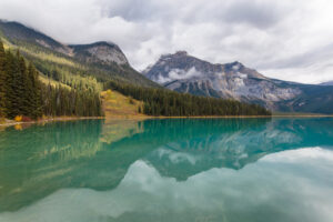 Mountain reflects off the water in Emerald Lake in Yoho National Park