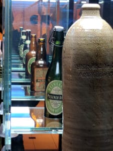 Different Heineken bottles through the years