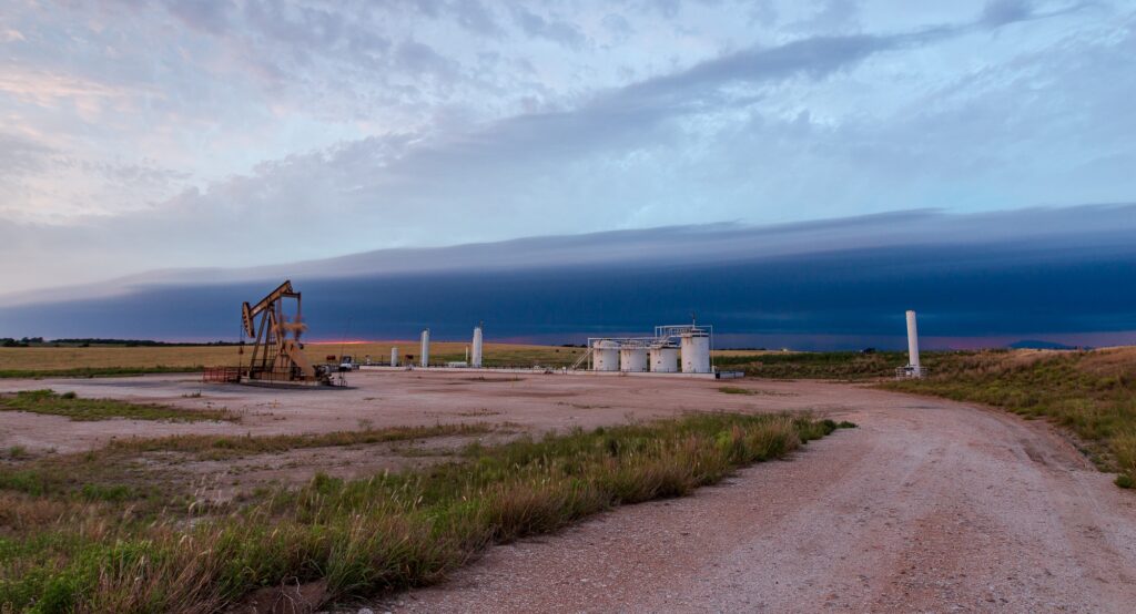 Shelf Cloud behind an oil pumpjack