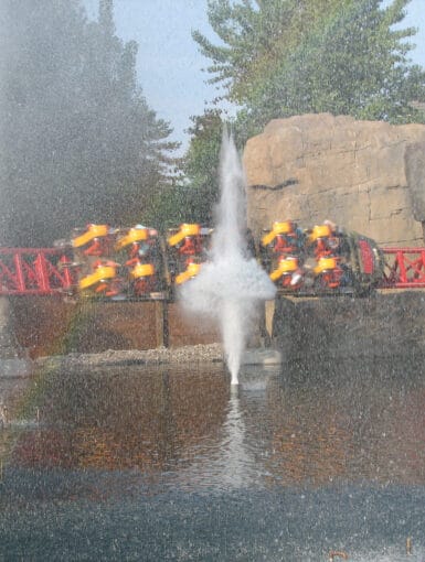 Water Canons shoot as the Maverick train goes by at Cedar Point
