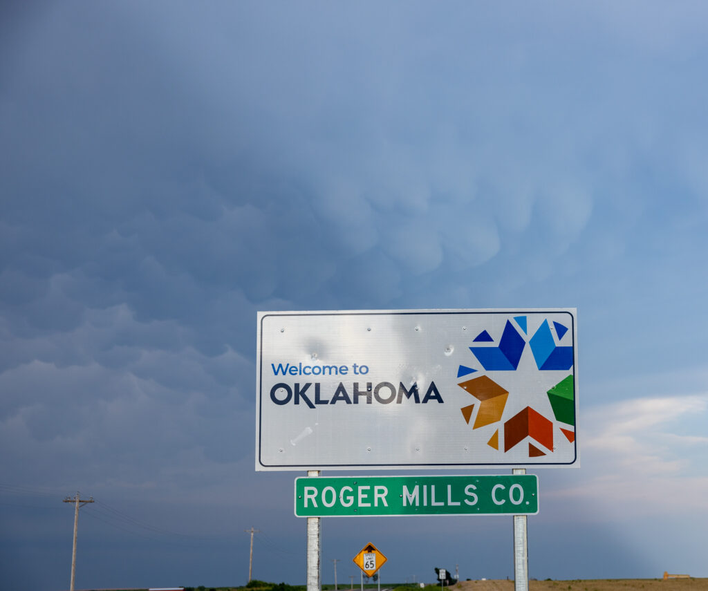 Welcome to Oklahoma Sign with mammatus behind it